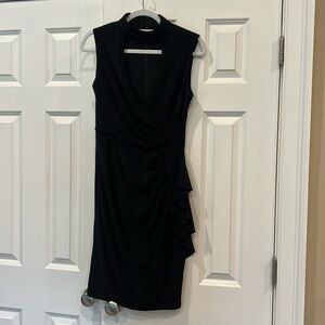 Sexy black line dress with keyhole neck and side ruffle detail